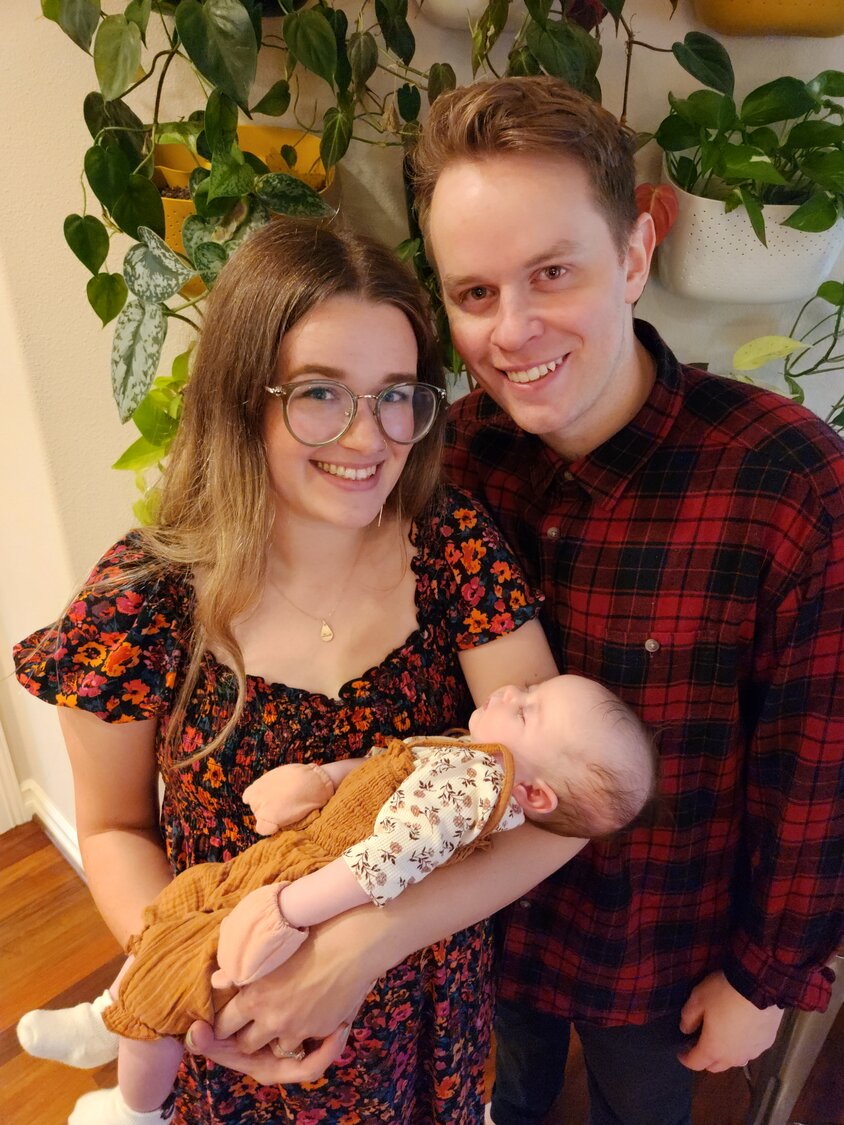 Robin and Danny are pictured with their daughter Juniper.